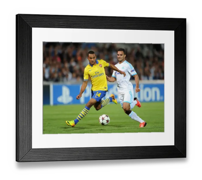 Framed Print : Theo Walcott Outruns Jeremy Morel: Marseille vs. Arsenal, UEFA Champions League, 2013