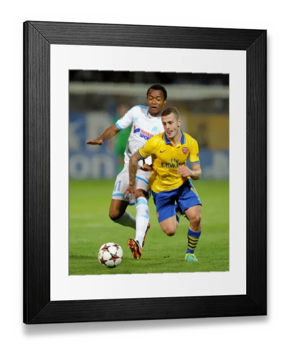Framed Print : Clash of Midfield Maestros: Jack Wilshere vs. Jordan Ayew, Marseille vs. Arsenal, UEFA Champions League, 2013
