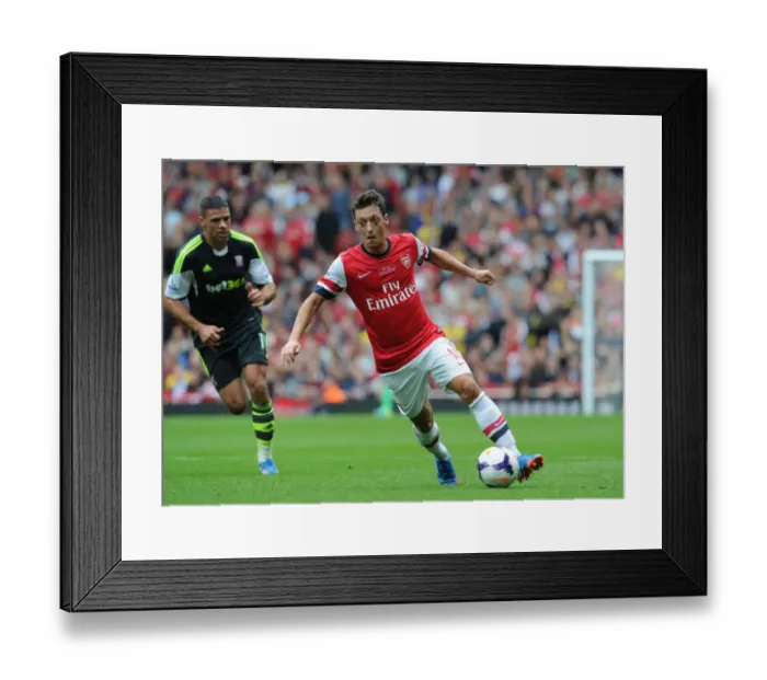 Framed Print : Mesut Ozil in Action: Arsenal vs Stoke City, Premier League 2013-14