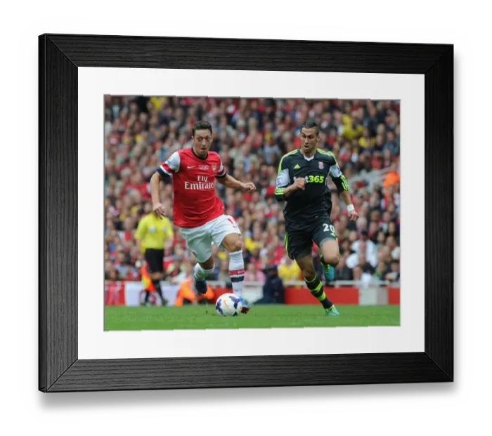 Framed Print : Mesut Ozil Outsmarts Geoff Cameron: Arsenal's Masterclass in the 2013-14 Premier League Framed Print : Mesut Ozil Outsmarts Geoff Cameron: Arsenal's Masterclass in the 2013-14 Premier League