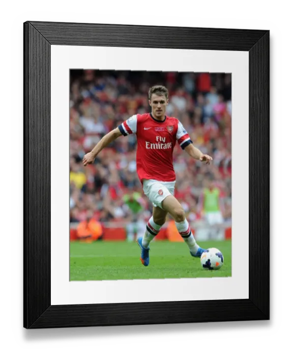 Framed Print : Aaron Ramsey in Action: Arsenal vs Stoke City, Premier League 2013-14