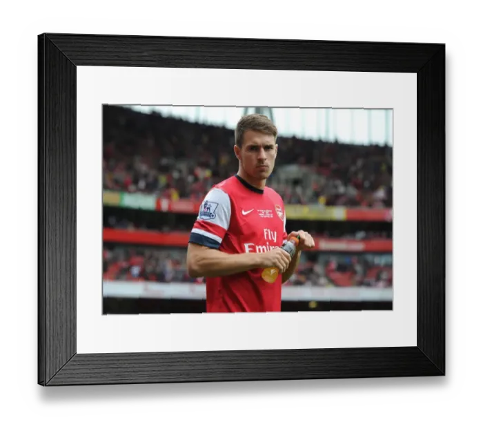Framed Print : Aaron Ramsey in Action: Arsenal vs Stoke City, Premier League 2013-14 Framed Print : Aaron Ramsey in Action: Arsenal vs Stoke City, Premier League 2013-14