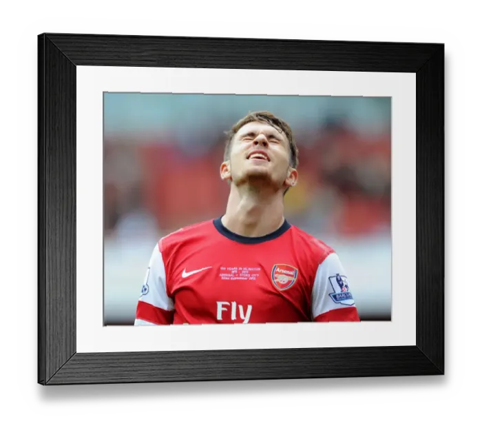 Framed Print : Aaron Ramsey: In Action for Arsenal Against Stoke City, Premier League 2013-14