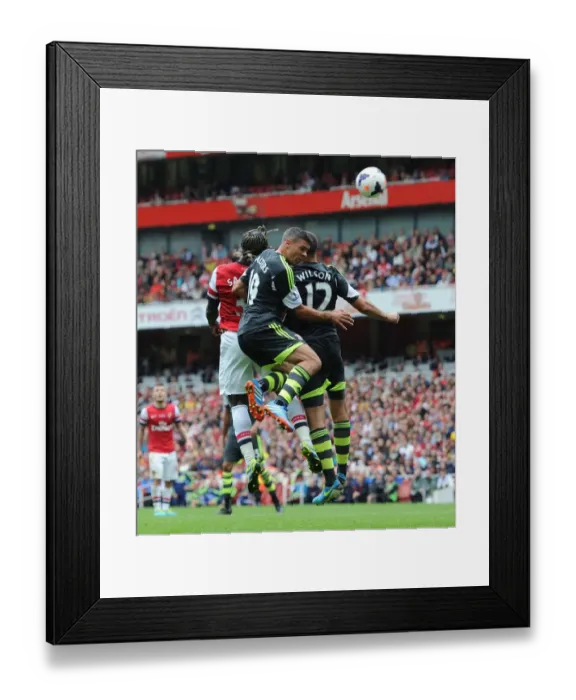 Framed Print : Sagna Scores Third Goal for Arsenal Against Stoke Amidst Pressure from Walters and Wilson