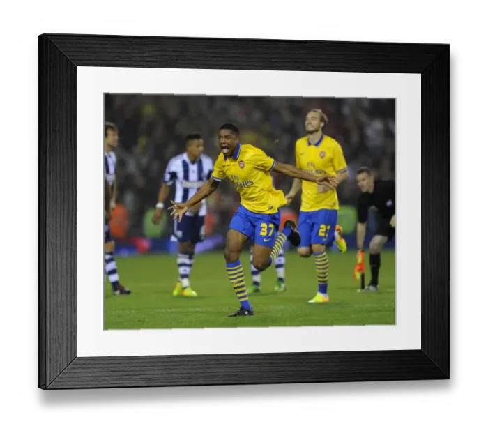 Framed Print : Chuba Akpom Scores the Game-winning Penalty: Arsenal Advance in Capital One Cup against West Bromwich Albion (2013-14)