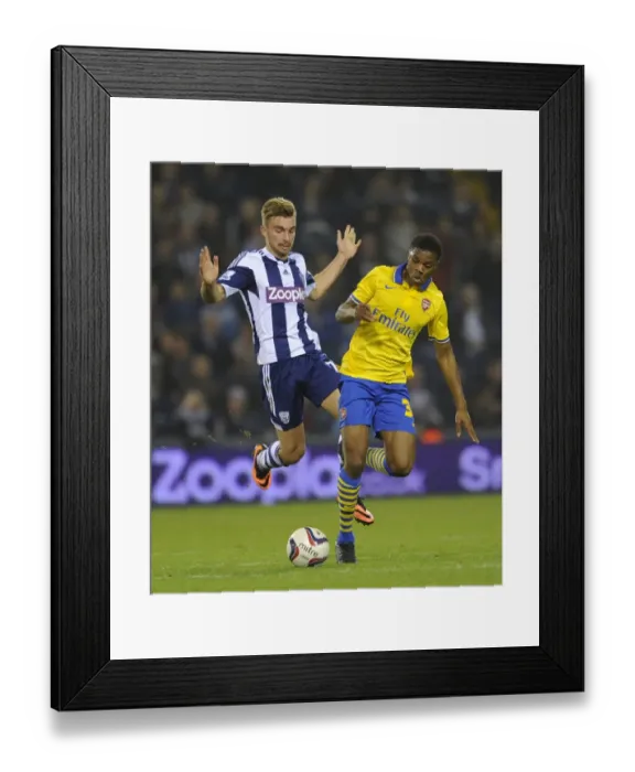 Framed Print : Akpom vs. Morrison: A Battle in the Capital One Cup - Arsenal's Akpom Clashes with West Bromwich Albion's Morrison (September 2013) Framed Print : Akpom vs. Morrison: A Battle in the Capital One Cup - Arsenal's Akpom Clashes with West Bromwich Albion's Morrison (September 2013)