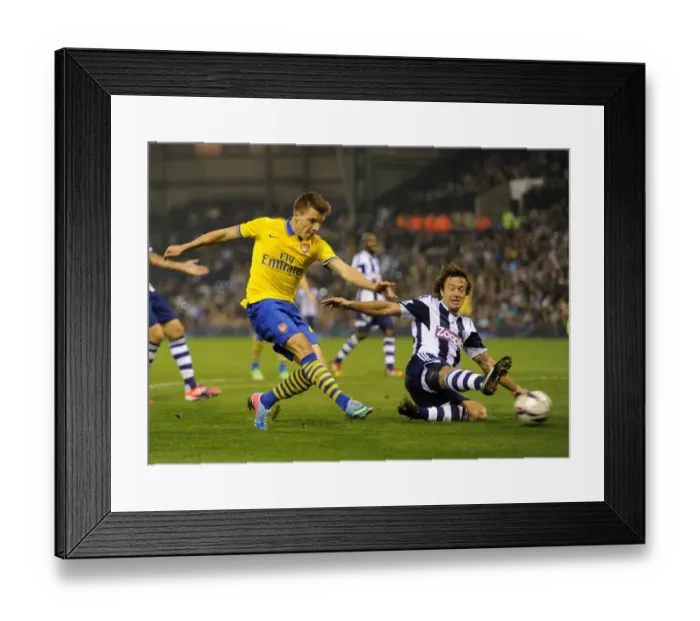 Framed Print : Thomas Eisfeld vs Diego Lugano: A Capital One Cup Battle