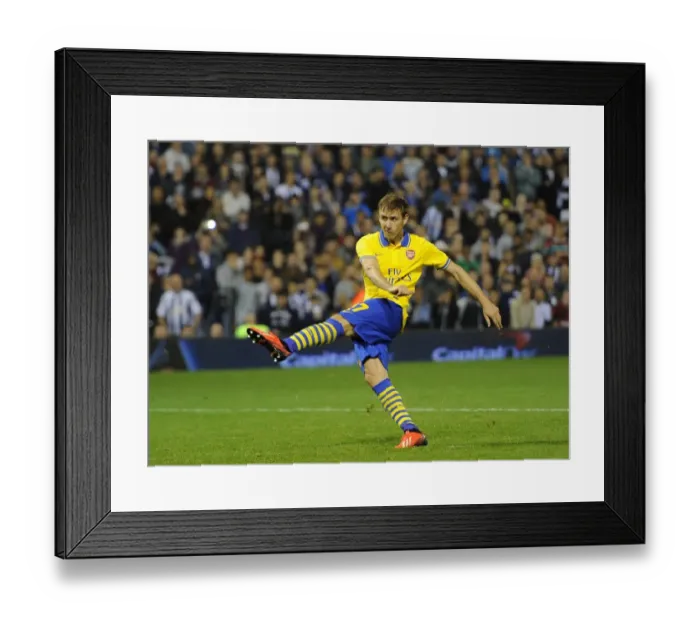 Framed Print : Nacho Monreal Scores the Winning Penalty: Arsenal Advance in Capital One Cup vs West Bromwich Albion Framed Print : Nacho Monreal Scores the Winning Penalty: Arsenal Advance in Capital One Cup vs West Bromwich Albion