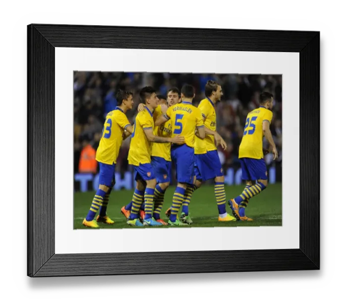 Framed Print : Arsenal Celebrate Penalty Shootout Victory Over West Bromwich Albion in Capital One Cup