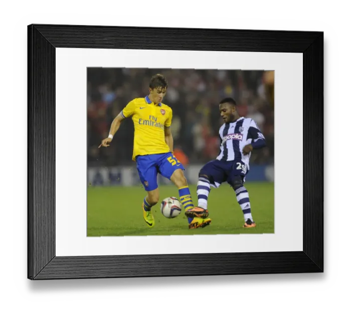 Framed Print : Clash of the Titans: Olsson vs Sessegnon in the Capital One Cup Showdown (West Bromwich Albion vs Arsenal, 2013-14) Framed Print : Clash of the Titans: Olsson vs Sessegnon in the Capital One Cup Showdown (West Bromwich Albion vs Arsenal, 2013-14)