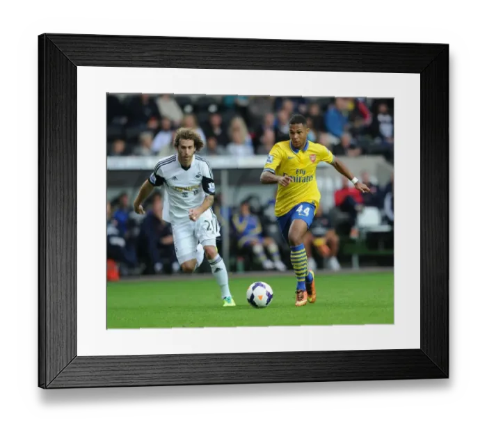 Framed Print : Serge Gnabry vs Jose Canas: A Premier League Battle at Swansea City Framed Print : Serge Gnabry vs Jose Canas: A Premier League Battle at Swansea City