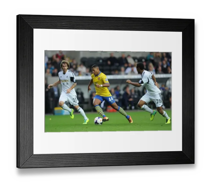 Framed Print : Serge Gnabry vs. Jose Canas and Jonathan De Guzman: Intense Battle at Swansea City vs. Arsenal (2013-14) Framed Print : Serge Gnabry vs. Jose Canas and Jonathan De Guzman: Intense Battle at Swansea City vs. Arsenal (2013-14)