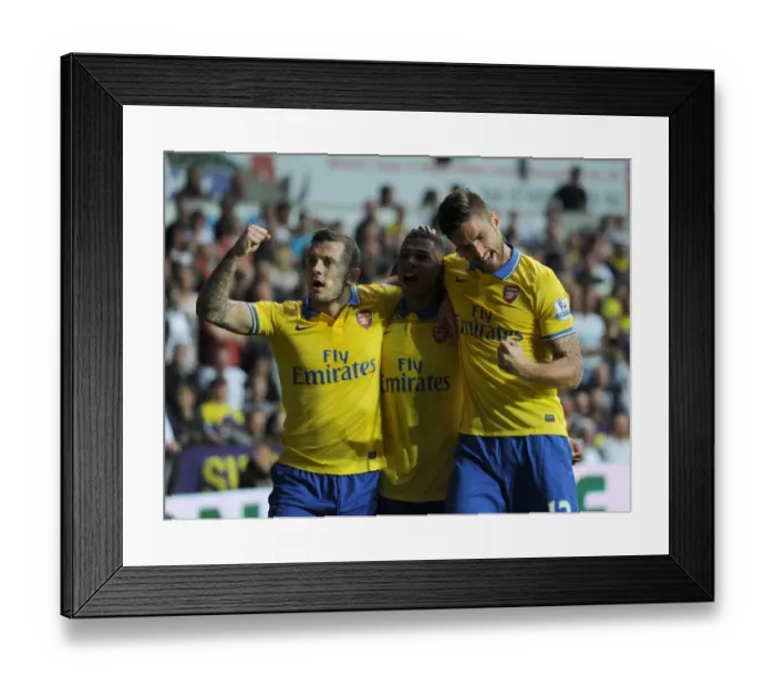 Framed Print : Serge Gnabry, Jack Wilshere, and Olivier Giroud Celebrate Arsenal's First Goal vs Swansea City (2013-14)