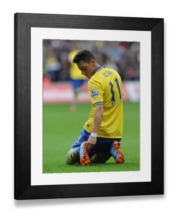 Framed Print : Mesut Ozil in Action: Swansea City vs. Arsenal, Premier League 2013-14