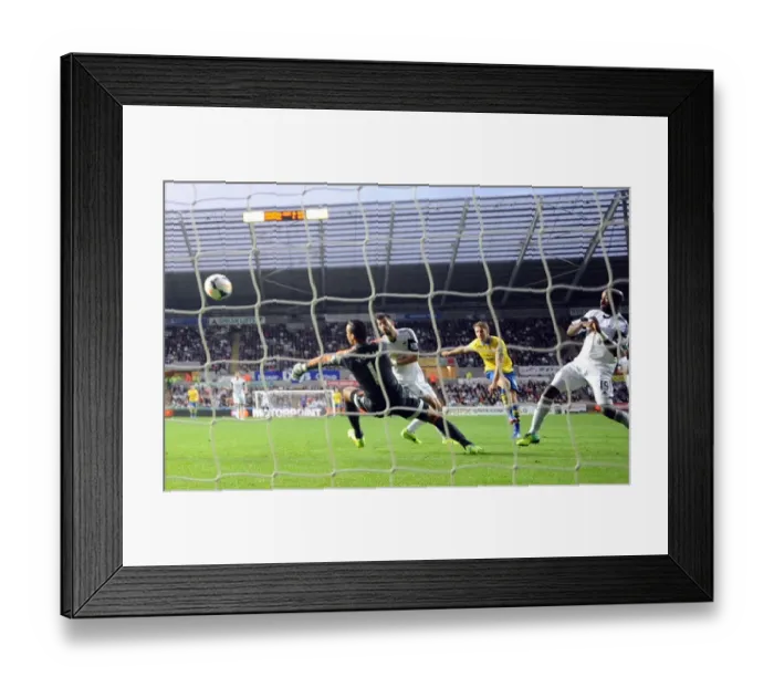 Framed Print : Aaron Ramsey Scores Arsenal's Second Goal vs Swansea City (2013-14) Framed Print : Aaron Ramsey Scores Arsenal's Second Goal vs Swansea City (2013-14)
