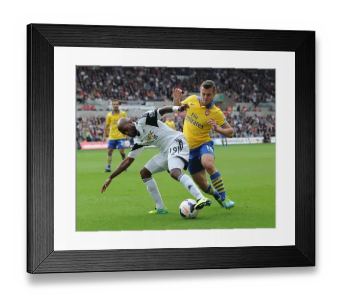 Framed Print : Intense Rivalry: Wilshere vs. Tiendalli - The Battle at Swansea's Liberty Stadium