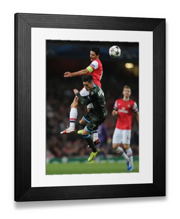 Framed Print : Arsenal vs. Napoli: Mikel Arteta vs. Jose Callejon Clash in 2013-14 Champions League