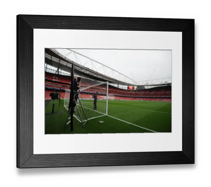 Framed Print : Preparing the North Bank: Arsenal v SSC Napoli, UEFA Champions League (2013-14)