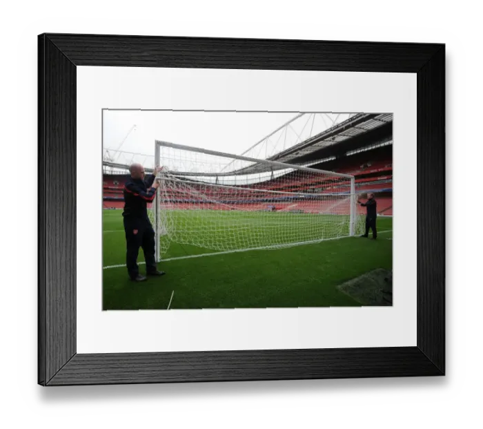Framed Print : Preparing for Battle: Arsenal's North Bank Goal Set for Napoli Clash, 2013-14 UEFA Champions League Framed Print : Preparing for Battle: Arsenal's North Bank Goal Set for Napoli Clash, 2013-14 UEFA Champions League