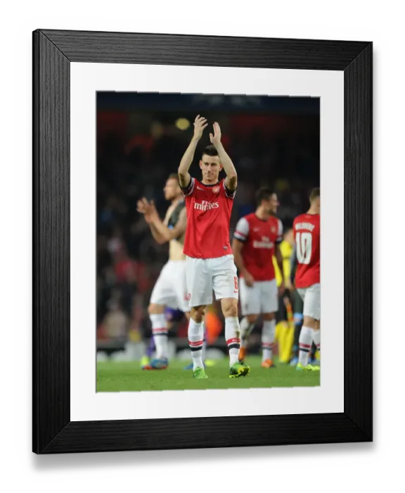 Framed Print : Laurent Koscielny: Arsenal's Steadfast Defender Against Napoli in the Champions League (2013) Framed Print : Laurent Koscielny: Arsenal's Steadfast Defender Against Napoli in the Champions League (2013)