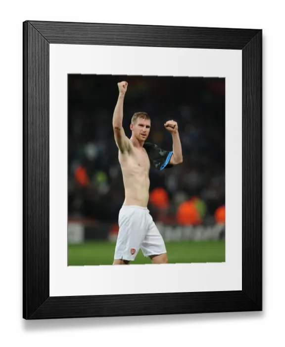 Framed Print : Per Mertesacker's Celebration: Arsenal Triumphs Over Napoli in Champions League (2013) Framed Print : Per Mertesacker's Celebration: Arsenal Triumphs Over Napoli in Champions League (2013)