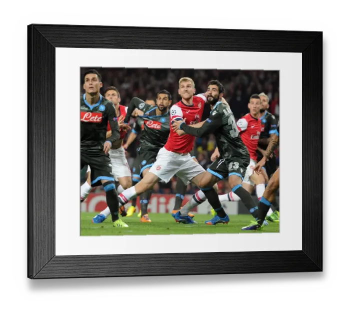 Framed Print : Clash of Titans: Per Mertesacker vs. Raul Albiol - Arsenal vs. Napoli, UEFA Champions League