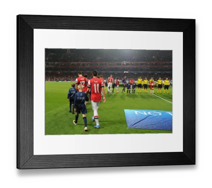 Framed Print : Mesut Ozil: Arsenal's Star Player Prepares for Arsenal v Napoli Champions League Clash Framed Print : Mesut Ozil: Arsenal's Star Player Prepares for Arsenal v Napoli Champions League Clash