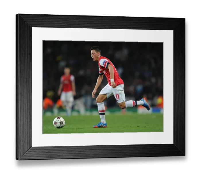 Framed Print : Mesut Ozil in Action: Arsenal vs. SSC Napoli, UEFA Champions League, 2013