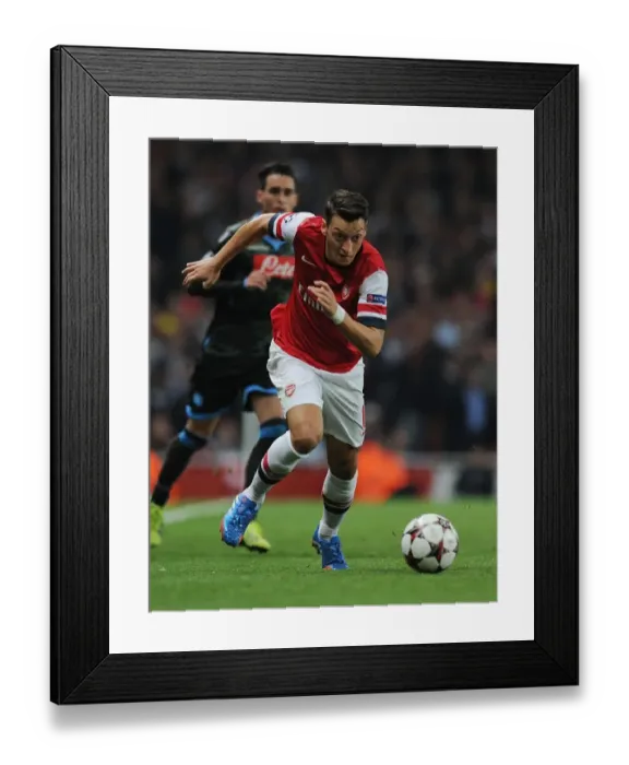 Framed Print : Mesut Ozil in Action: Arsenal vs SSC Napoli, UEFA Champions League, 2013