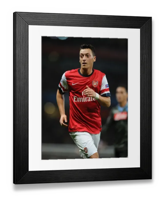 Framed Print : Mesut Ozil in Action: Arsenal vs. SSC Napoli, UEFA Champions League, 2013