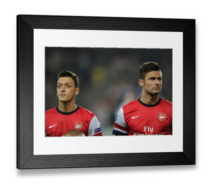 Framed Print : Arsenal's Ozil and Giroud: United in Focus at the Emirates (Arsenal v Napoli, 2013-14 Champions League)