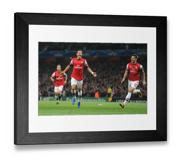 Framed Print : Mesut Ozil and Olivier Giroud Celebrate Arsenal's First Goal Against Napoli in the 2013-14 UEFA Champions League Framed Print : Mesut Ozil and Olivier Giroud Celebrate Arsenal's First Goal Against Napoli in the 2013-14 UEFA Champions League