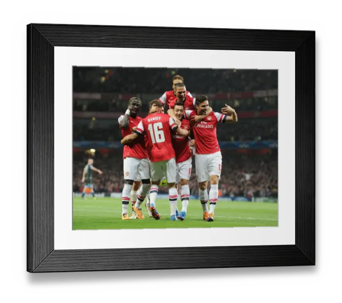 Framed Print : Arsenal Celebrate Ozil's Goal Against Napoli in 2013-14 Champions League