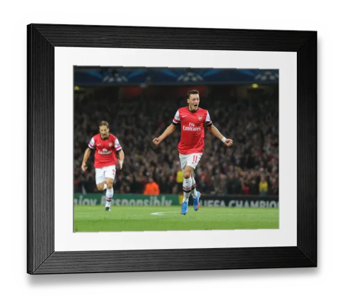 Framed Print : Mesut Ozil Scores First Arsenal Goal: Arsenal vs. SSC Napoli, UEFA Champions League 2013-14 Framed Print : Mesut Ozil Scores First Arsenal Goal: Arsenal vs. SSC Napoli, UEFA Champions League 2013-14