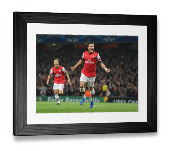 Framed Print : Mesut Ozil Scores First Arsenal Goal: Arsenal vs. SSC Napoli, UEFA Champions League 2013-14