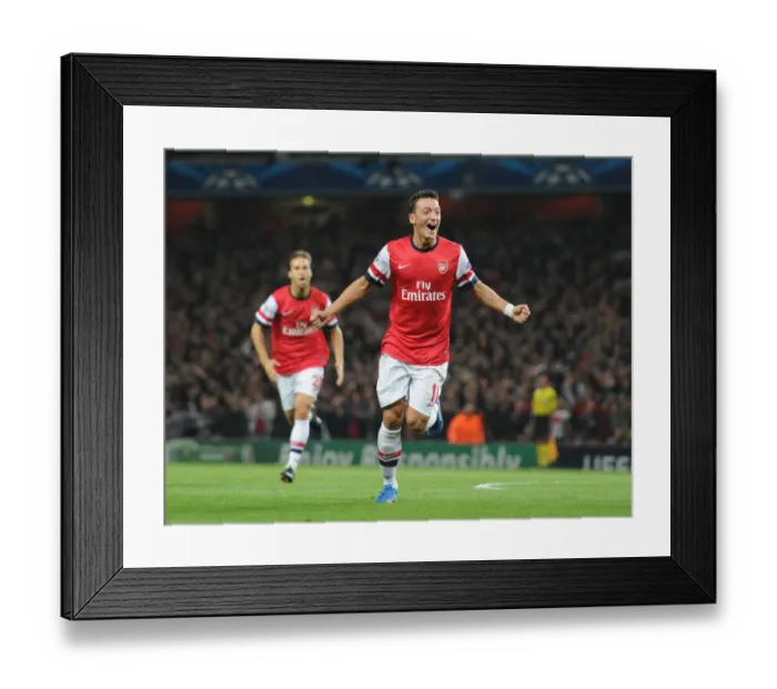 Framed Print : Mesut Ozil Scores First Arsenal Goal: Arsenal vs. SSC Napoli, UEFA Champions League 2013-14 Framed Print : Mesut Ozil Scores First Arsenal Goal: Arsenal vs. SSC Napoli, UEFA Champions League 2013-14