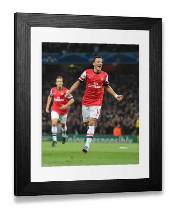 Framed Print : Mesut Ozil Scores First Arsenal Goal: Arsenal vs. SSC Napoli, UEFA Champions League 2013-14 Framed Print : Mesut Ozil Scores First Arsenal Goal: Arsenal vs. SSC Napoli, UEFA Champions League 2013-14