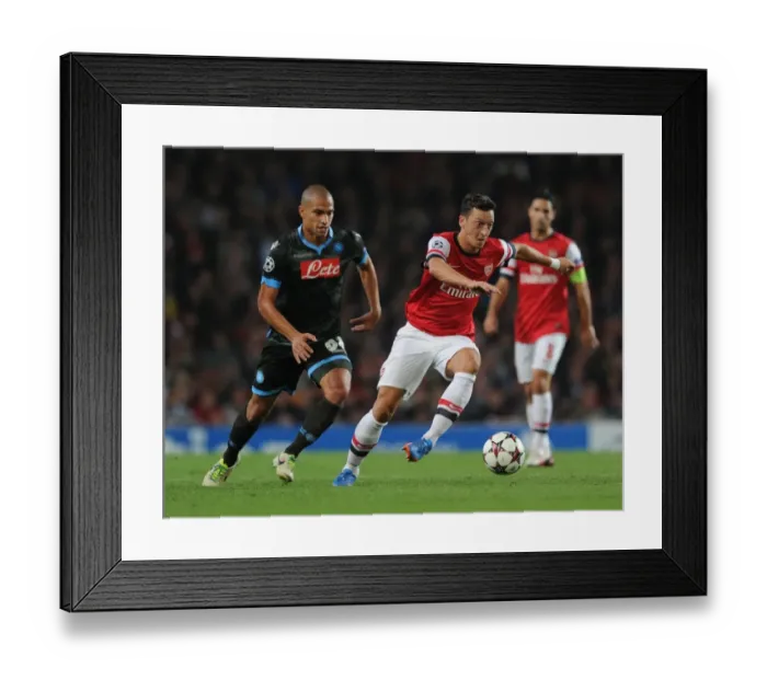 Framed Print : Mesut Ozil Outsmarts Gokhan Inler: Arsenal vs. Napoli, UEFA Champions League, 2013