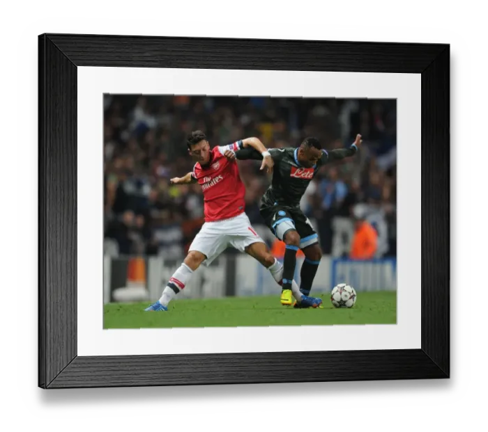 Framed Print : Mesut Ozil vs. Camilo Zuniga: Clash at the Emirates - Arsenal v Napoli, UEFA Champions League, 2013 Framed Print : Mesut Ozil vs. Camilo Zuniga: Clash at the Emirates - Arsenal v Napoli, UEFA Champions League, 2013