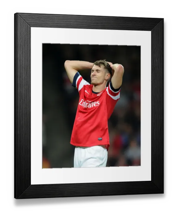 Framed Print : Aaron Ramsey in Action: Arsenal vs. Napoli, UEFA Champions League 2013-14
