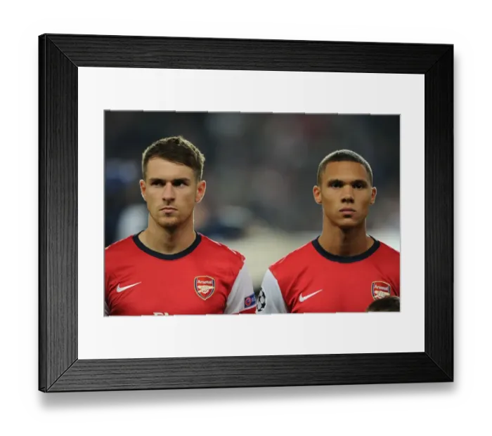 Framed Print : Arsenal Duo: Ramsey and Gibbs Prepare for Napoli Clash in 2013-14 Champions League