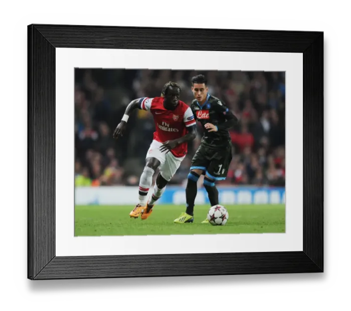 Framed Print : Battling Past Napoli: Sagna's Determined Run at Emirates Stadium (Arsenal v Napoli 2013-14) Framed Print : Battling Past Napoli: Sagna's Determined Run at Emirates Stadium (Arsenal v Napoli 2013-14)
