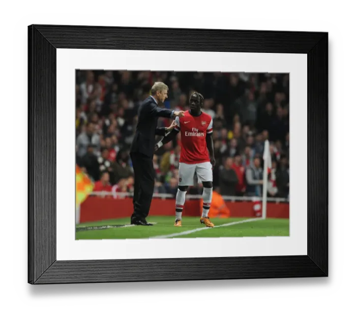 Framed Print : Arsene Wenger Conferring with Bacary Sagna during Arsenal vs Napoli, UEFA Champions League (2013) Framed Print : Arsene Wenger Conferring with Bacary Sagna during Arsenal vs Napoli, UEFA Champions League (2013)
