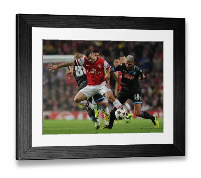 Framed Print : Arsenal vs Napoli: Wilshere Faces Off Against Inler and Behrami Framed Print : Arsenal vs Napoli: Wilshere Faces Off Against Inler and Behrami