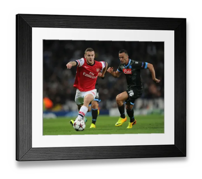 Framed Print : Jack Wilshere vs. Giandomenico Mesto: A Football Battle in the Arsenal vs. Napoli UEFA Champions League Clash, 2013 Framed Print : Jack Wilshere vs. Giandomenico Mesto: A Football Battle in the Arsenal vs. Napoli UEFA Champions League Clash, 2013