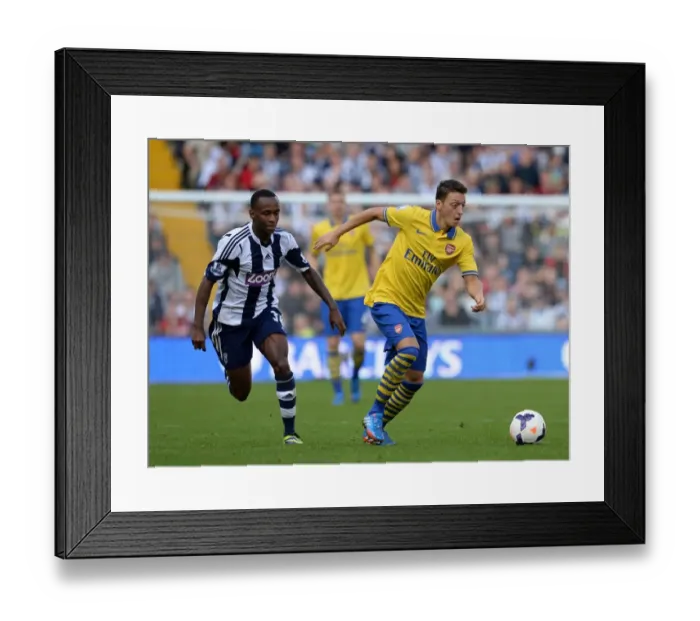 Framed Print : Mesut Ozil vs Saido Berahino: Clash of the Midfield Maestros - West Bromwich Albion vs Arsenal (2013-14) Framed Print : Mesut Ozil vs Saido Berahino: Clash of the Midfield Maestros - West Bromwich Albion vs Arsenal (2013-14)