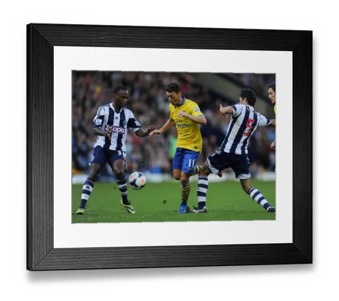 Framed Print : Mesut Ozil Clashes with Claudio Yacob and Saido Berahino during West Bromwich Albion vs Arsenal, Premier League 2013-14