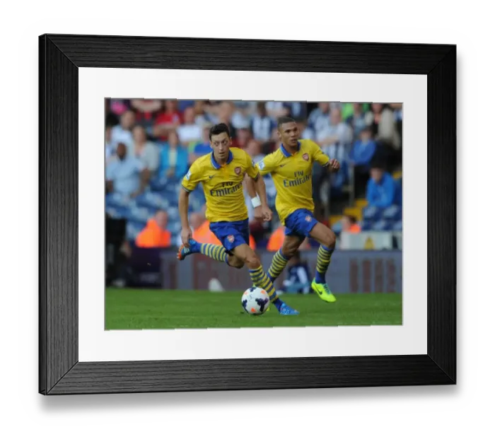 Framed Print : Mesut Ozil and Kieran Gibbs of Arsenal Facing Off Against West Bromwich Albion (2013-14) Framed Print : Mesut Ozil and Kieran Gibbs of Arsenal Facing Off Against West Bromwich Albion (2013-14)