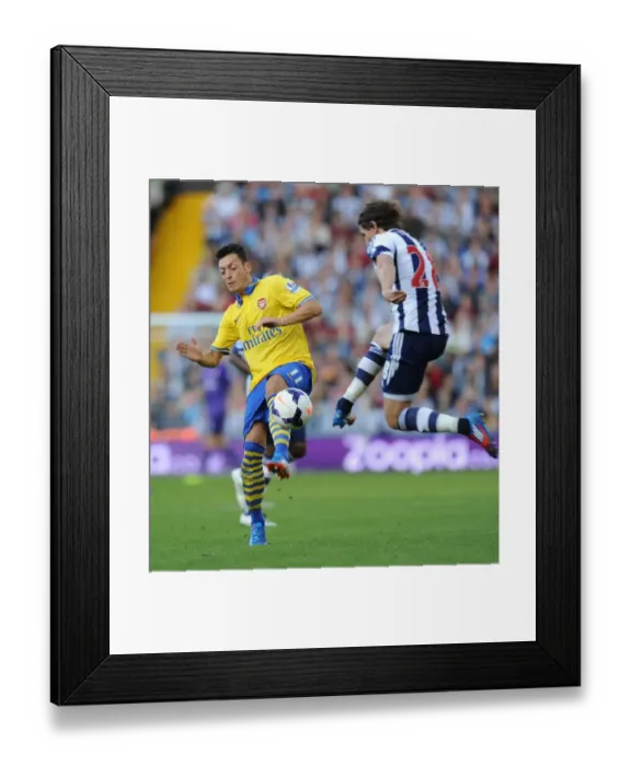 Framed Print : Mesut Ozil vs Billy Jones: Clash at The Hawthorns - Arsenal vs West Bromwich Albion, 2013-14 Premier League Framed Print : Mesut Ozil vs Billy Jones: Clash at The Hawthorns - Arsenal vs West Bromwich Albion, 2013-14 Premier League