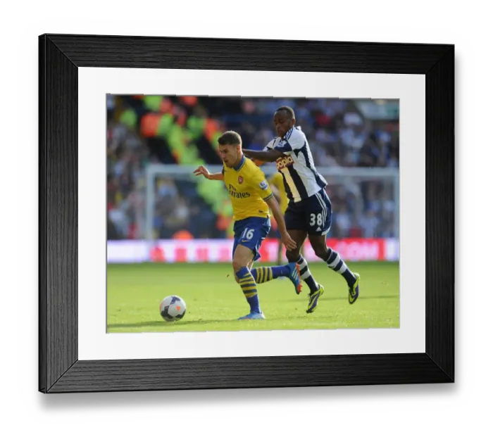 Framed Print : Aaron Ramsey vs. Saido Berahino: Clash at The Hawthorns (West Bromwich Albion vs. Arsenal, 2013-14) Framed Print : Aaron Ramsey vs. Saido Berahino: Clash at The Hawthorns (West Bromwich Albion vs. Arsenal, 2013-14)